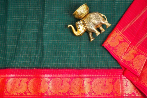 Green sungudi cotton saree with red zari border